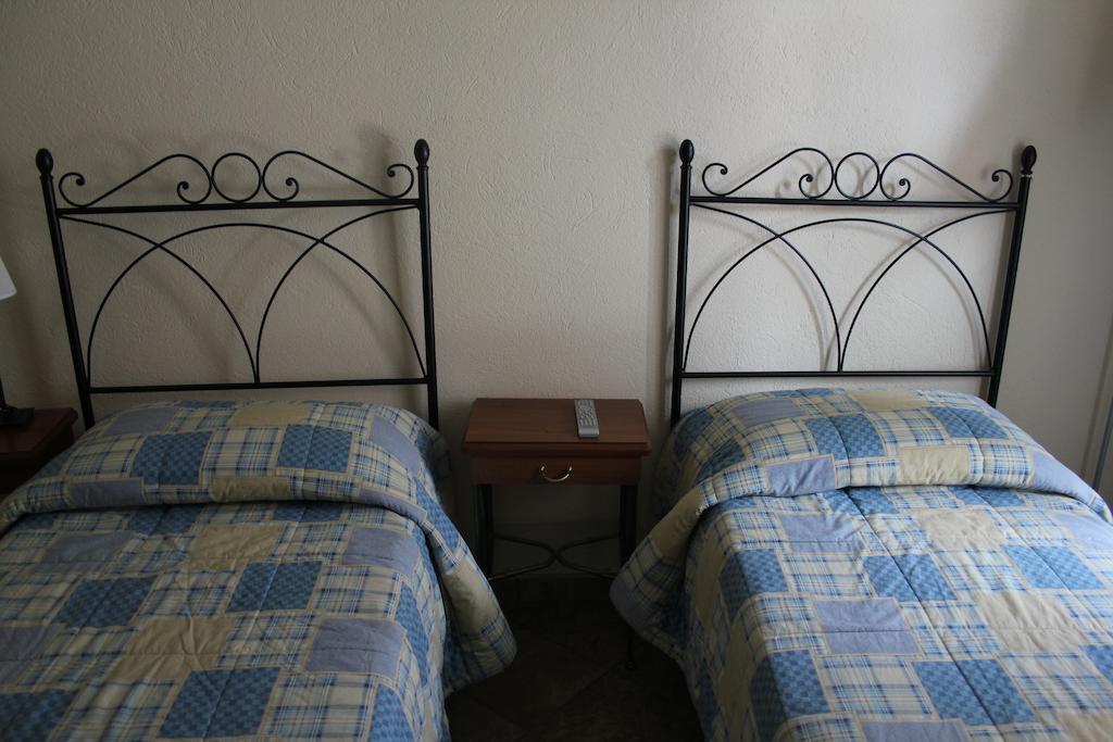 Hotel Porta Santa Maria Busca Kamer foto